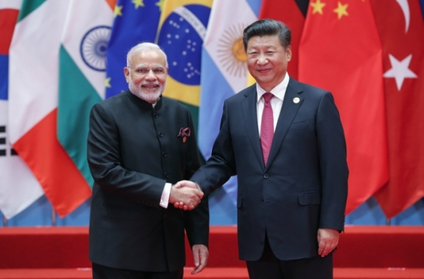 Chinese President Xi Jinping (right) shakes hands with Indian Prime Minister Narendra Modi to the G20 Summit on September 4, 2016 in Hangzhou, China. (Lintao Zhang/Getty Images)