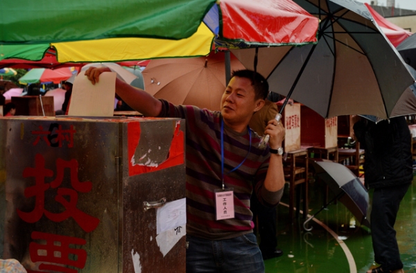 A local resident votes during elections in the village of Wukan on March 31, 2014. (Mark Ralston/AFP/Getty Images)