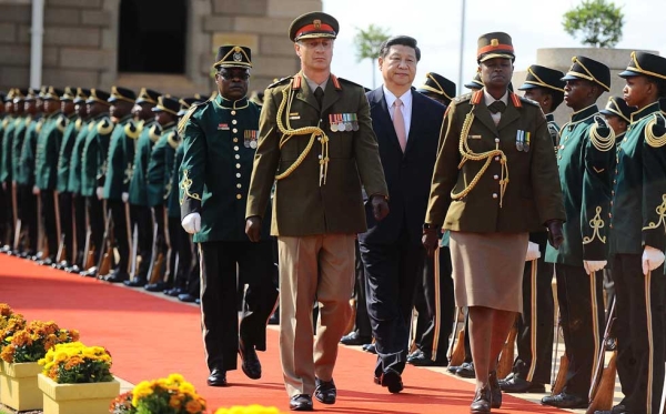 Xi Jinping (2nd L) arrives for a state visit at the Union Buildings in Pretoria on March 26, 2013.  (Stringer/AFP/Getty Images)