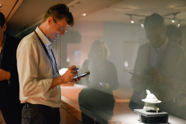 Asia Society trustee Charles Rockefeller admires a Korean ceramic on display at the Leeum Museum. 