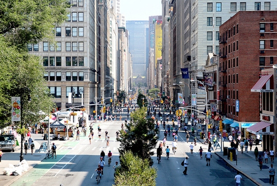 Bikers and pedestrians enjoy activities along Park Avenue during a Summer Streets event. (NYC DOT/Flickr)