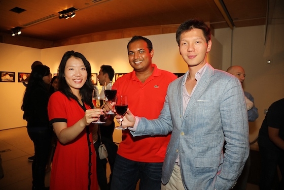 Friends pose for a photo at the First Friday Leo Bar at Asia Society New York on September 8, 2017. (Ellen Wallop/Asia Society)