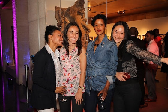 Friends pose for a photo at the First Friday Leo Bar at Asia Society New York on September 8, 2017. (Ellen Wallop/Asia Society)