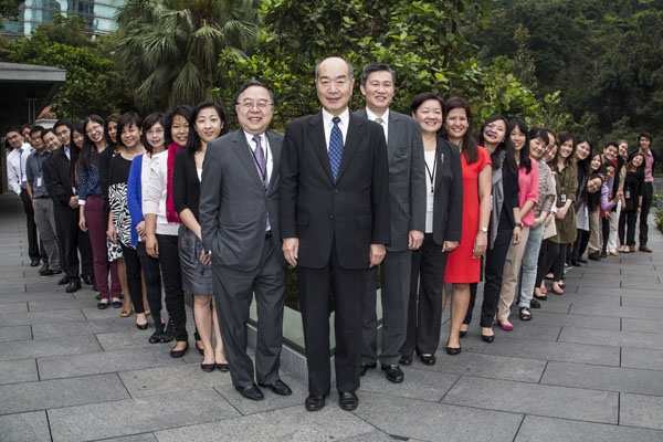 Staff members of Asia Society Hong Kong Center and Ronnie Chan, Co-Chairman of Asia Society and Chairman of Asia Society Hong Kong Center (second left from middle) welcomed Alex Yasumoto (middle) at the corner of the Yasumoto Bridge on April 16, 2013.  