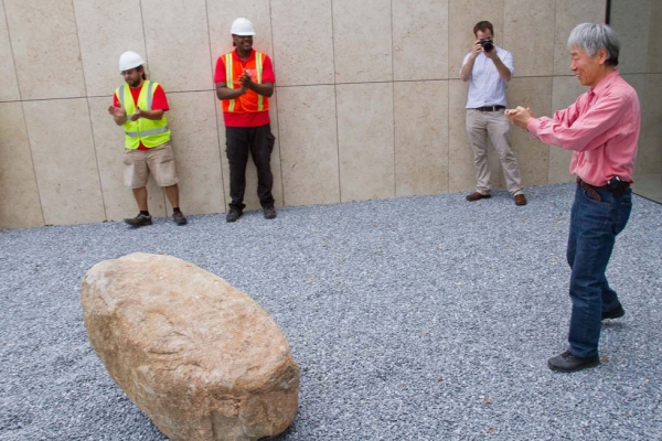 Lee approves the placement of the stone and prepares to install the second element of Relatum – signal. (Richard Carson)