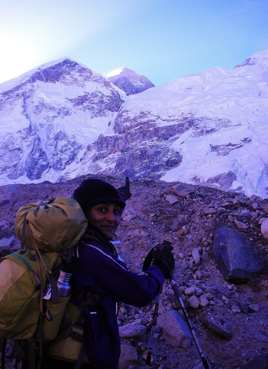 There it is! Trekking from Gorak Shep to Base Camp, Chandani points out Mt. Everest in the far distance. Most trekkers stay overnight at Gorak Shep, as their trekking permits will not allow them to camp at Everest Base Camp. (Chandani Punia)
