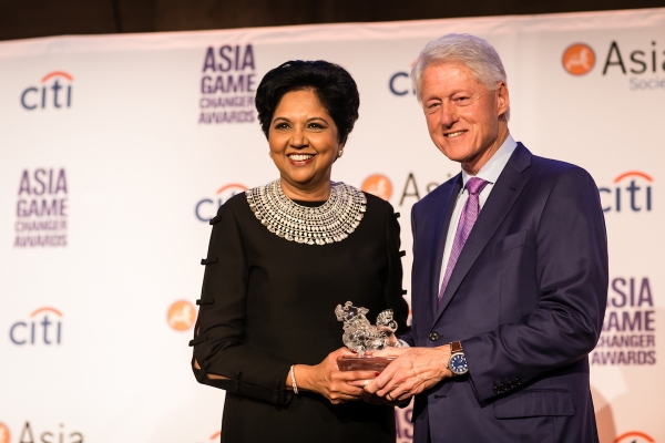 Indra Nooyi and Bill Clinton at the Asia Game Changers awards ceremony in New York, October 9, 2018