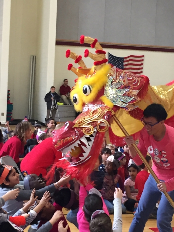 Forest Hills Public Schools elementary students experience a dragon dance while celebrating the Chinese New Year. 
