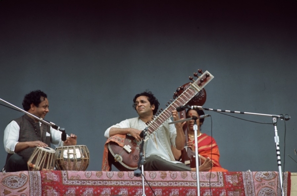 One of Shankar&apos;s breakthrough performances in the US came at the Monterey Pop Festival in June 1967, where he played before tens of thousands with tabla player Alla Rakha (L) and Kamala (R) on tamboura. (Don Nelson/Fotos International/Getty Images)