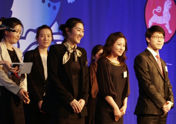 ASKC staff are introduced at the Holiday Cocktail Reception. Front row, L-R: Kyo Yoon Park, Boram Lee, and Eric Lim. Back row, L-R: Boram Hong, Heidi Choi, and Kimberely Hall. (Asia Society Korea Center)