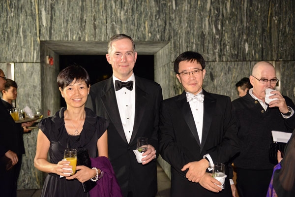 Amy Hui, spouse of Raymond Cheng, Clifford Hart, Consul General of U.S. Consulate General, and Raymond Cheng, CEO of Sozo Group and Alabama China Partnership at cocktail reception on Joseph Lau and Josephine Lau Roof Garden at Thanksgiving Gala Dinner in Asia Society Hong Kong Center on November 23, 2013