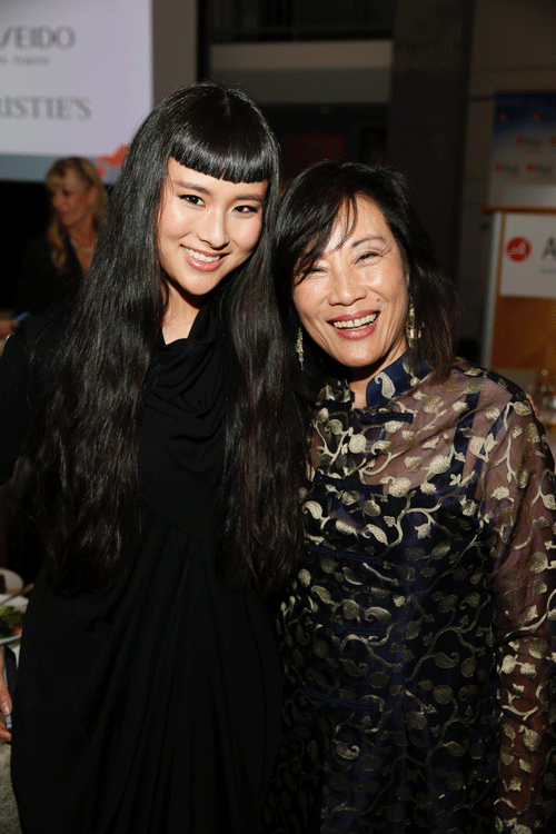 From left, Asia Chow and Janet Yang pose during the Asia Society Southern California 2016 Annual Gala at the Skirball Cultural Center on May 22, 2016, in Los Angeles, California. (Photo by Ryan Miller/Capture Imaging)