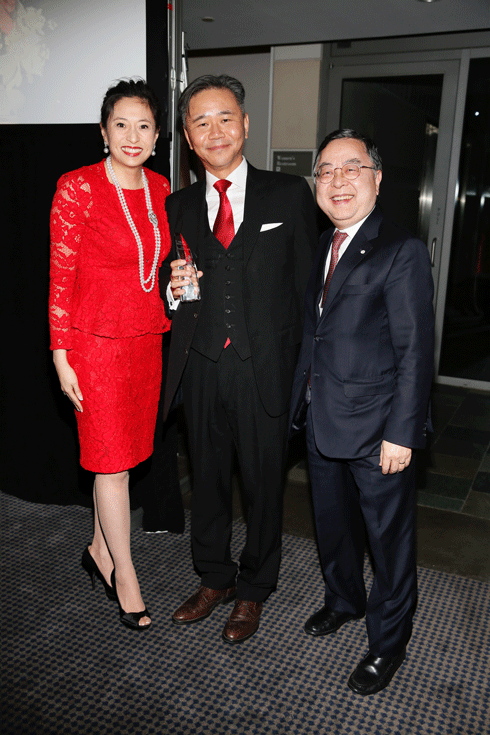 From left, the 2016 Philanthropic Visionaries Shirley Wang and Walter Wang and presenter Ronnie Chan, pose during the Asia Society Southern California 2016 Annual Gala at the Skirball Cultural Center on May 22, 2016, in Los Angeles, California. (Photo by Ryan Miller/Capture Imaging)