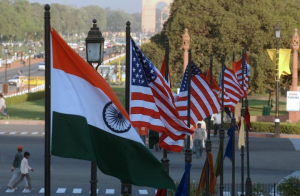 U.S. and Indian flags fly on Rajpath in front of India Gate in New Delhi, India. (Manpreet Romana/AFP/Getty Images)