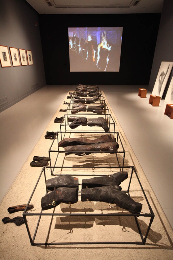 "Burned Victims." FX Harsono, 1998. Burned wood, metal, shoes, and performance video with sound Dimensions variable; Video duration: 8 minutes, 41 seconds. Singapore Art Museum Collection.