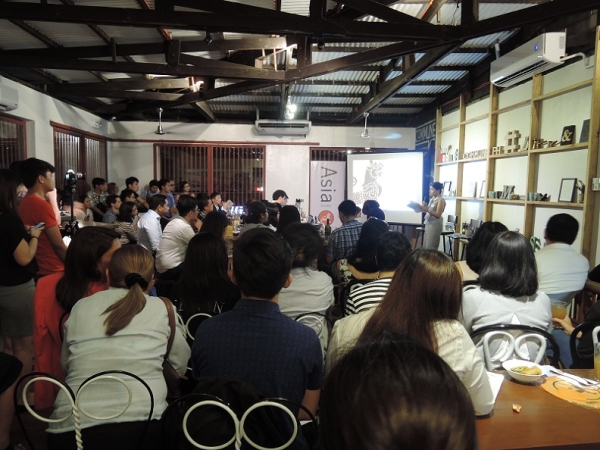Full-house at Commune Cafe: Kathryn Cardenas, Program Officer for Global Initiatives of Asia Society delivers the welcome remarks at the 2nd installment of Asia 21 Conversations - 'Shaping Tomorrow’s Leaders and Rockstars: Is Our Education System Ready?'