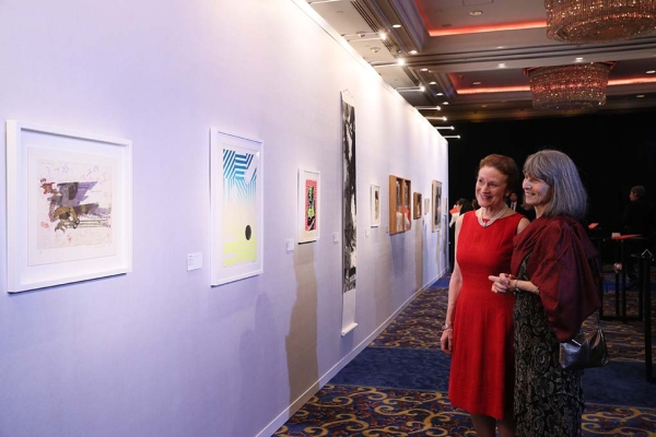 Asia Society Global Co Chair Henrietta H. Fore and Elizabeth Lancaster viewing 2017 Asia Arts Awards Hong Kong auction offerings.