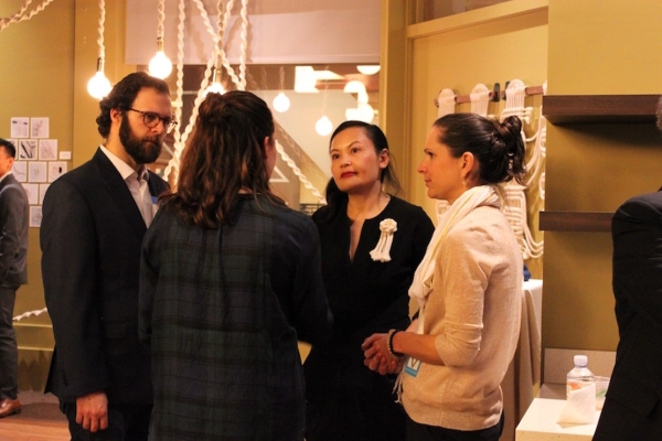 Artist Windy Chien speaks with guests during the reception (Ranna Iglesias Asia Society).