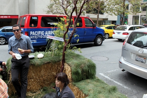 City Grazing built a PARKing day installation from hay bales and grass. 