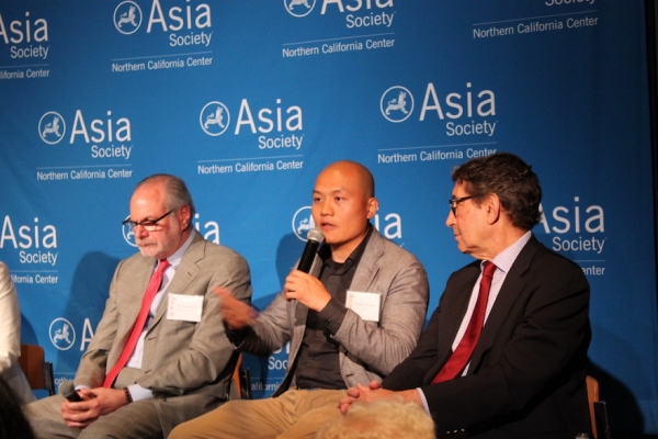 Zhengyu Huang, Chairman of ImmCapital, answers a question from the audience. (Asia Society)