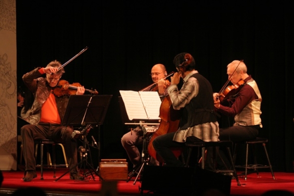 Cultural Achievement honorees the Kronos Quartet perform onstage before accepting their award. (Bill Swersey/Asia Society)