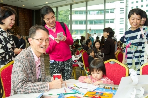 Mr. Choe Young U enjoyed participating at the Arts and Crafts Corner of Korea Family Day.