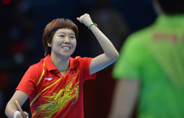 GOLD: China's Li Xiaoxia celebrates her victory in the table tennis women's gold medal singles match on August 1, 2012. (Saeed Khan/AFP/GettyImages)