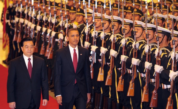 President Obama walks beside Chinese President Hu Jintao (L) during a welcoming ceremony at the Great Hall of the People in Beijing on November 17, 2009. (Frederic J. Brown/AFP/Getty Images)