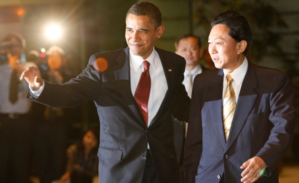 President Obama (L) is escorted by Japanese Prime Minister Yukio Hatoyama upon his arrival at the Prime Minister&apos;s official residence on November 13, 2009 in Tokyo, Japan, the first leg of his Asian tour. (Issei Kato-Pool/Getty Images)
