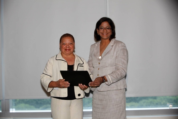 Debra Turner Bailey, Global Diversity Officer at Corning Incorporated receives the Honor for Distinguished Practice for the Best Company for Mentoring from Subha Barry