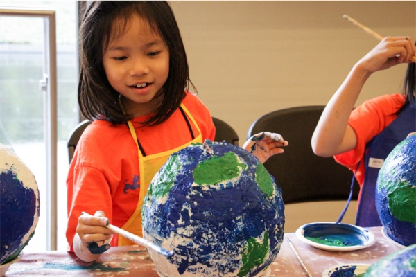 Campers create globes with "keys to a change-friendly world." (Nikki Tripp)