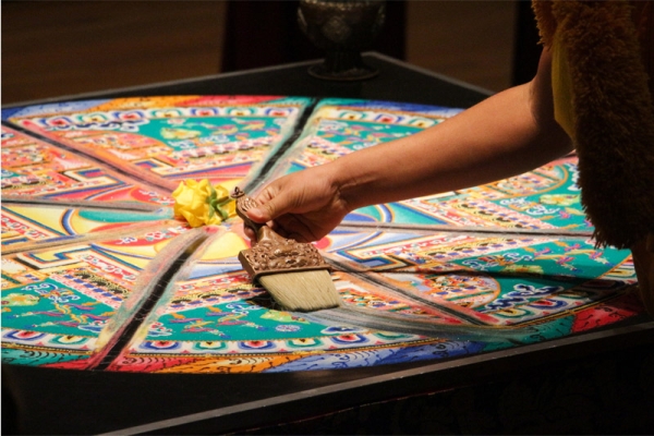An hour after its the completion, the sand mandala was swept away, symbolizing the impermanence of life. (Nikki Tripp)