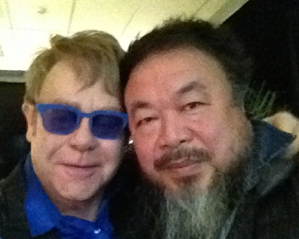 A grainy shot from Ai Weiwei's Instagram of him (R) and singer Elton John (L) backstage at the singer's Beijing concert on November 25. (Ai Weiwei/Instagram) 