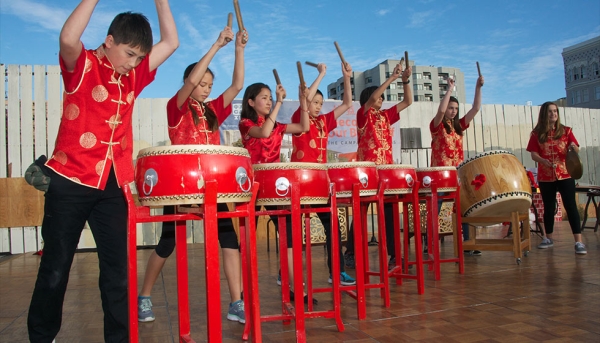 Student musicians perform at middle school groundbreaking. (Chinese American International School)