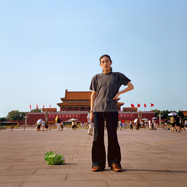 Walking the Cabbage in Tiananmen Square, Beijing 2001.
Courtesy of Han Bing. 
