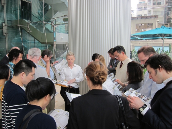 James Pierce (center), Director of the design firm Oval Partnerships, leads a tour of Old Wanchai. (Credit: Asia Society)