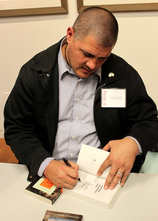 Adam Johnson signing his book, "The Orphan Master's Son" (Asia Society)