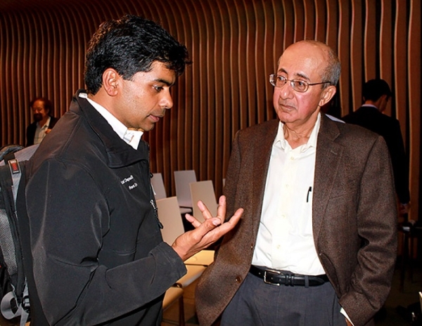 Rafiq Dossani talks with a guest at the event (Asia Society)