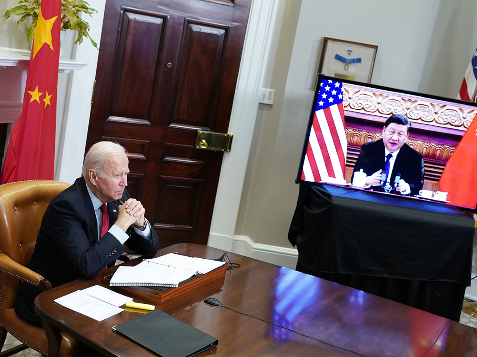 President Joe Biden conducts a virtual meeting with his Chinese counterpart, Xi Jinping