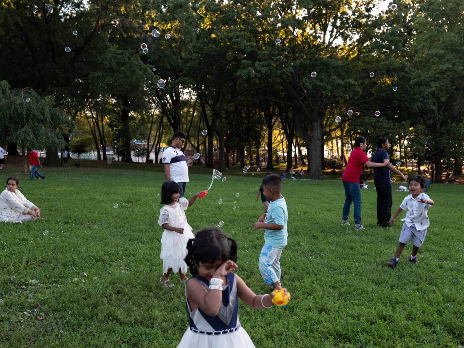 Children play at a picnic organized by Bangladeshi Americans in Astoria Park, Queens, on August 14, 2022. 