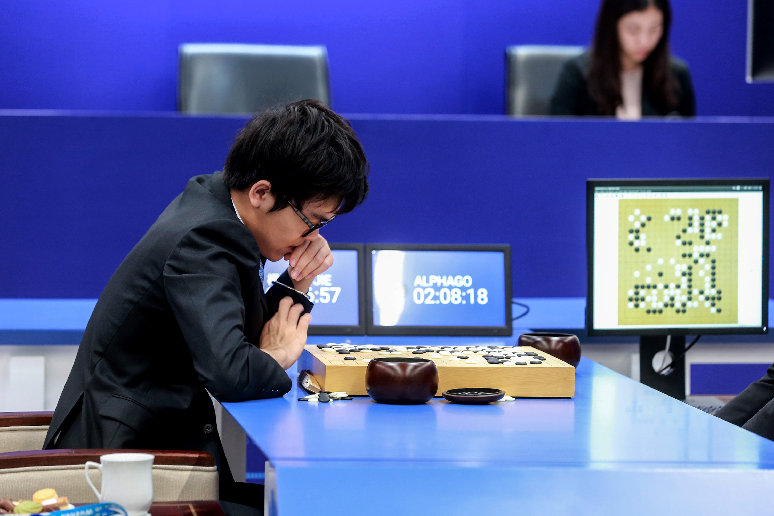 China's 19-year-old Go player Ke Jie prepares to make a move during the second match against Google's artificial intelligence program AlphaGo in Wuzhen, in eastern China's Zhejiang province on May 25, 2017. 