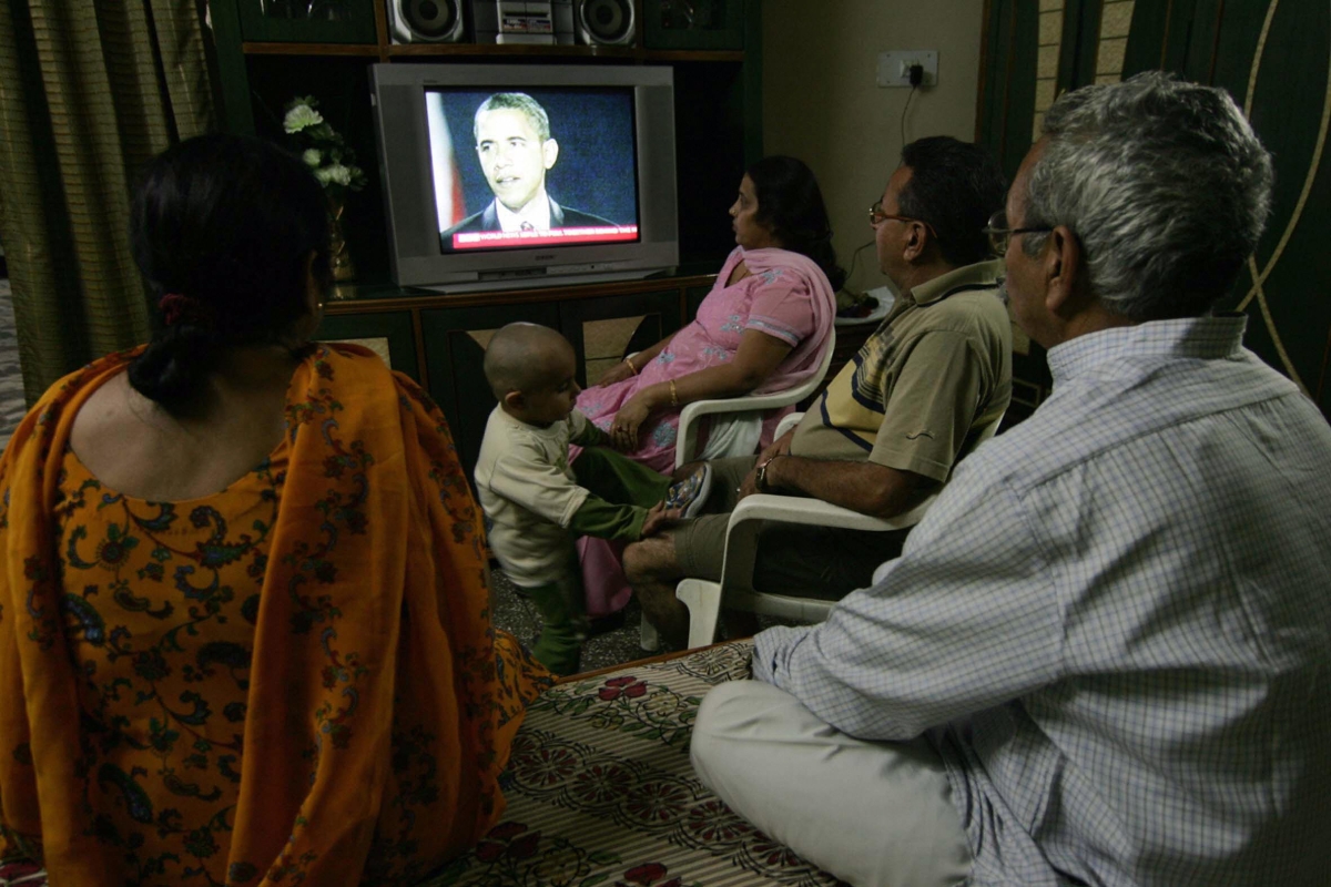 An Indian family watch television at home in Amritsar on November 5, 2008, as US President-elect Barack Obama addresses his election night victory rally. (Narinder Nanu/AFP/Getty Images)