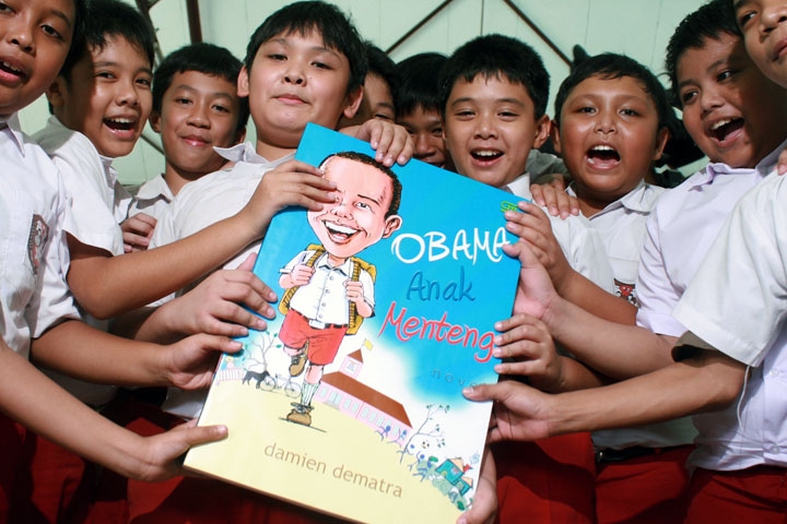 Indonesian schoolchildren display a book entitled Obama, Child of Menteng at Menteng primary school on Mar. 15, 2010. The book is based on interviews with people who knew the young Obama growing up in Jakarta in the late '60s. (STR/AFP/Getty Images) 