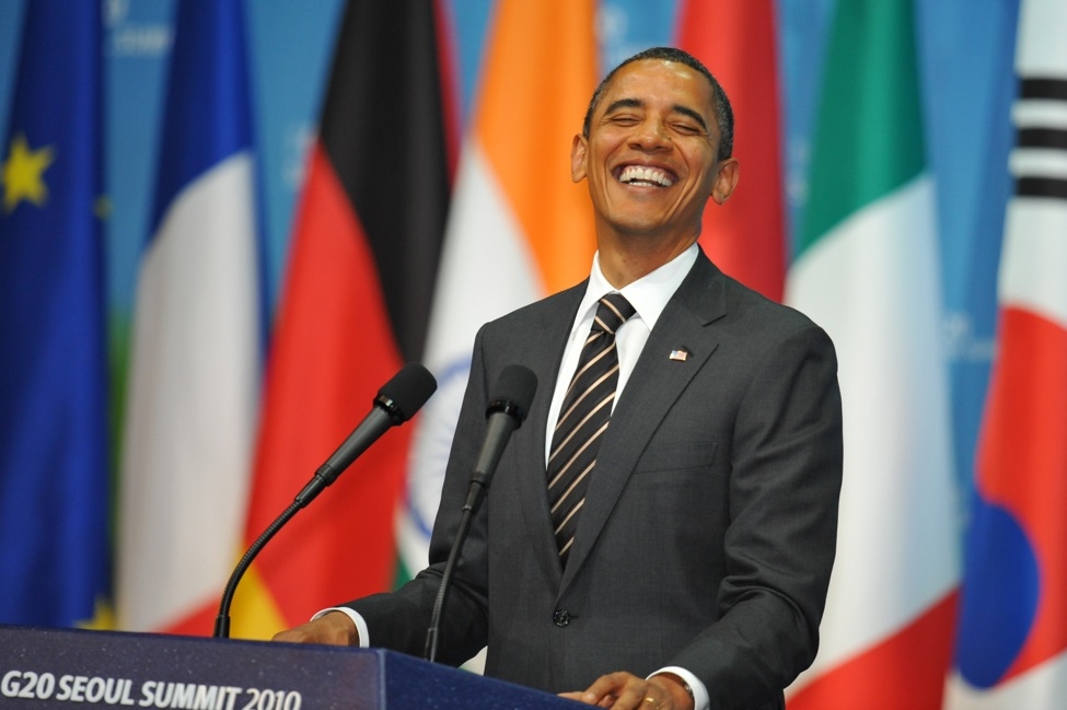 US President Barack Obama laughs during a press conference at the G20 Summit in Seoul on November 12, 2010. G20 leaders vowed to avoid tit-for-tat currency devaluations, but China&apos;s strong objections to any brakes on its export machine undermined a US push to redress skewed global trade. South Korea is the first non G-8 country to host the G-20 summit. (Jae-Hwan/AFP/Getty Images)