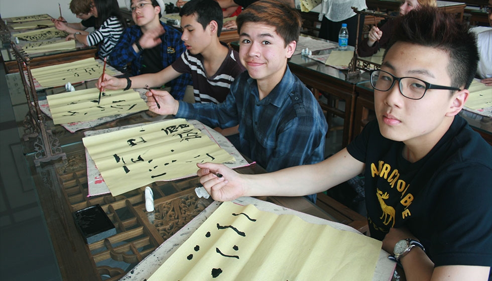 8th grade China Research Residency: calligraphy class at their sister school (Portland Public Schools)