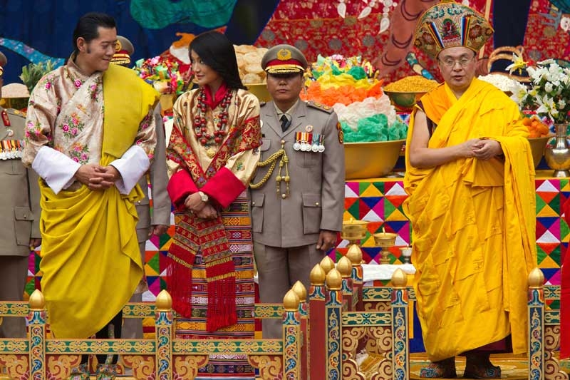 King Jigme Khesar Namgyel Wangchuck (L), 31, looks at his bride during the purification marriage ceremony to Queen Jetsun Pema, 21, in the historical Punakha Dzong on October 13, 2011 in Punakha, Bhutan. (Paula Bronstein/Getty Images)