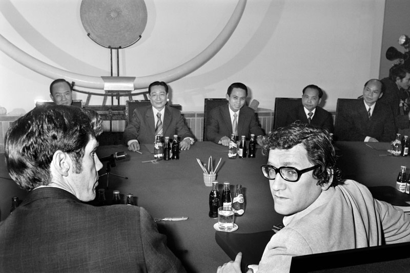 Picture released on Dec. 19, 1977 of Phan Hien (C, back), Vietnamese Vice-minister of Foreign Affairs facing Richard Holbrooke (R, front) U.S. Assistant Secretary of State for East Asian and Pacific Affairs, during U.S.-Vietnamese talks on normalizing relations between the countries, at the Vietnamese Embassy in Saigon. (Michel Clement/AFP/Getty Images)