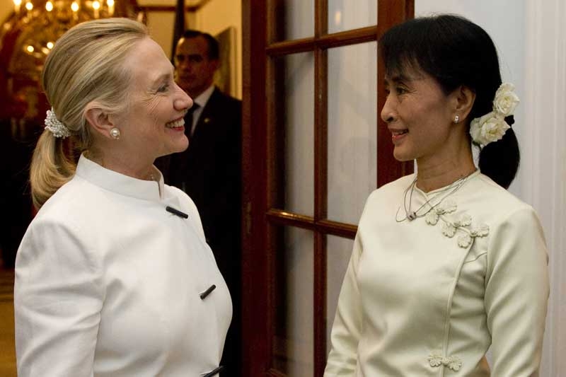 U.S. Secretary of State Hillary Clinton (L) and opposition leader Aung San Suu Kyi meet in Yangon, Myanmar, December 1, 2011. (Saul Loeb /AFP/Getty Images)