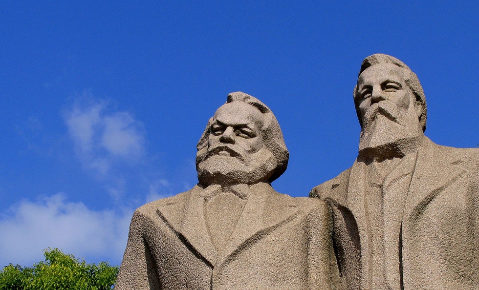 This statue of Karl Marx (L) and Friedrich Engels graces Shanghai's Fuxing Park. (Hennie Schaper/Flickr)