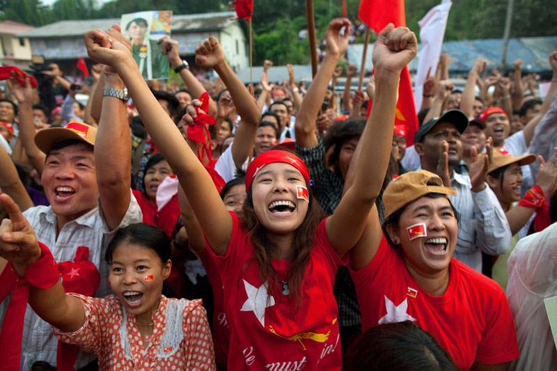 National League for Democracy (NLD) supporters celebrate their victory in parliamentary elections outside party headquarters on April 1, 2012 in Yangon, Myanmar. (Paula Bronstein/Getty Images) 